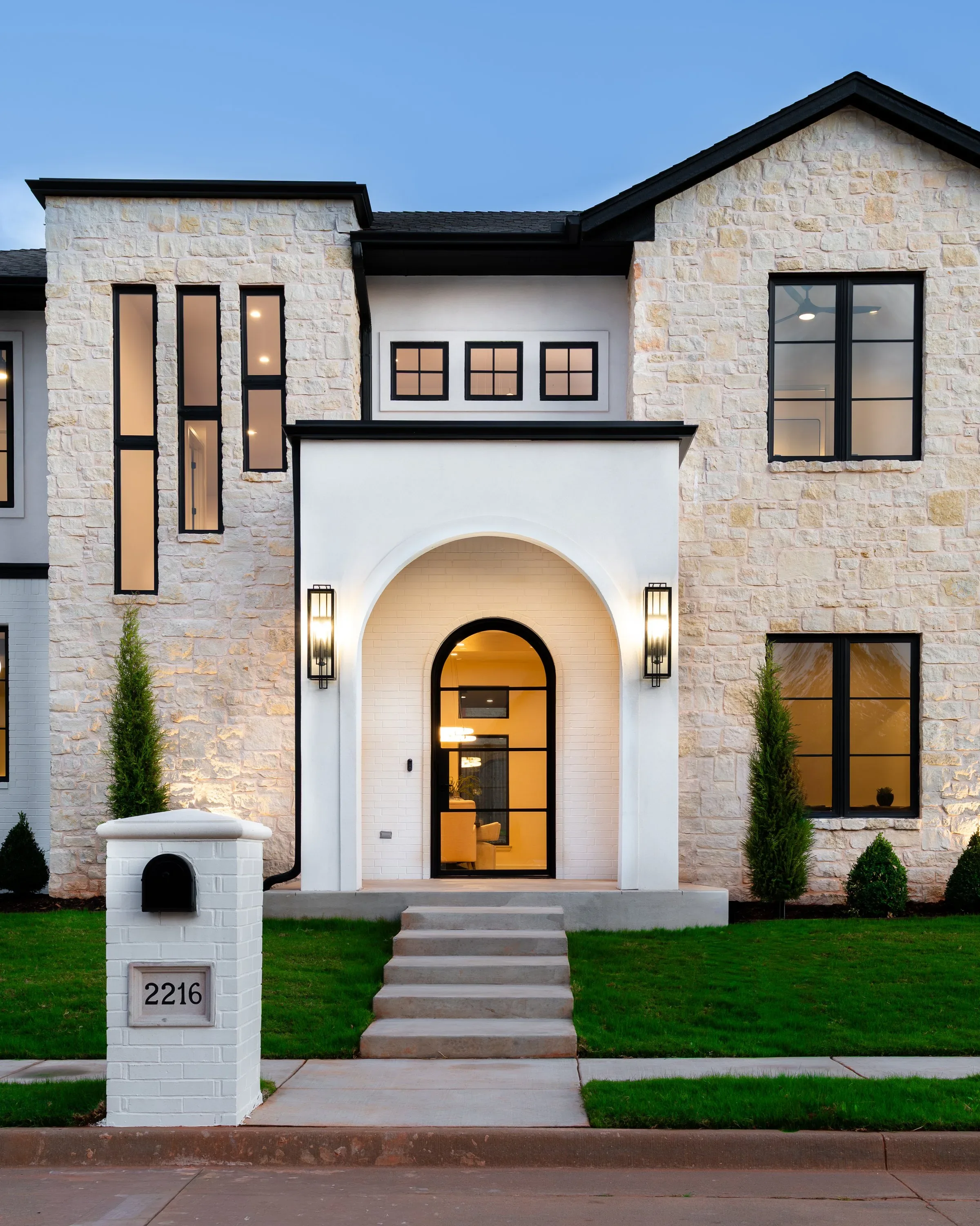 Stone and stucco exterior of a Travis Horton Homes custom home