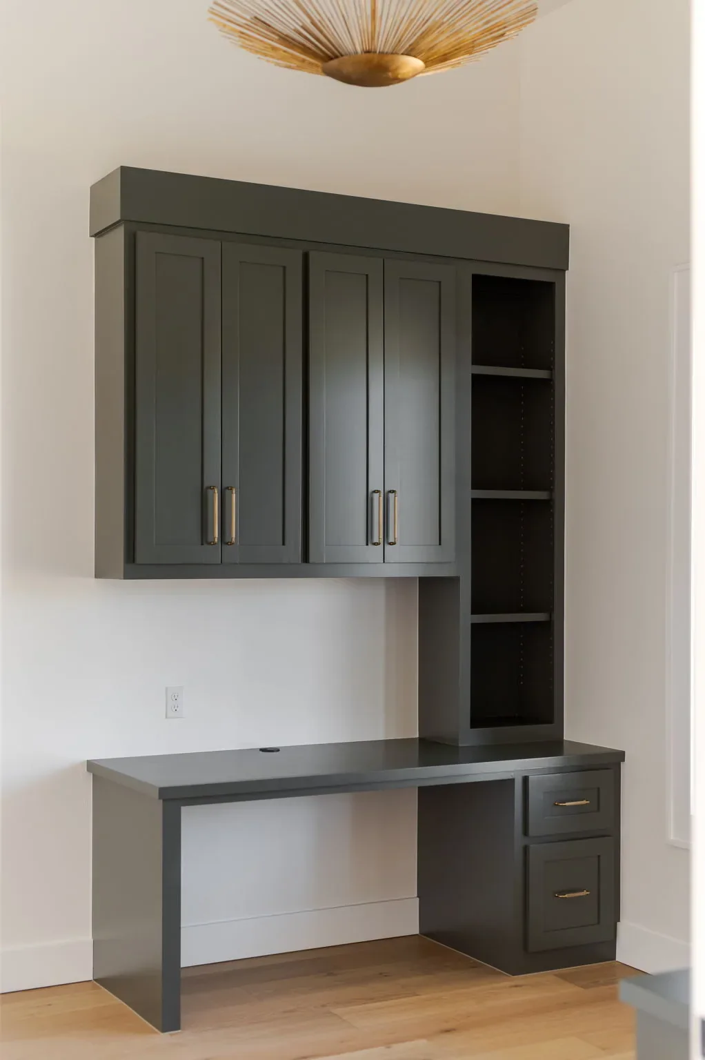 Home office built-in desk with charcoal cabinetry