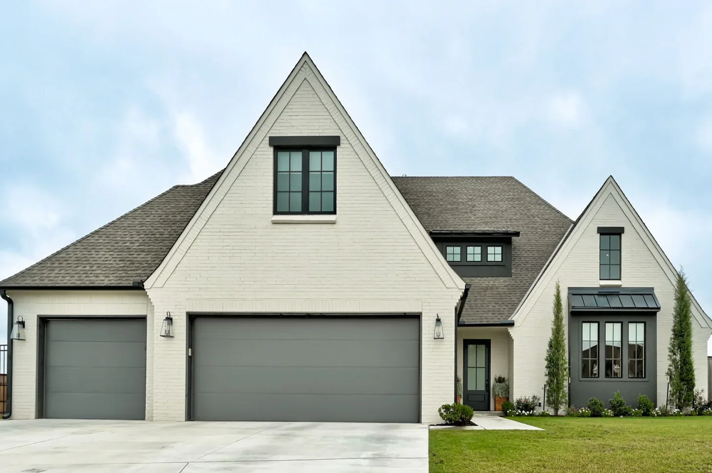 Front exterior of 2316 Stone Mill Ct with steep gables