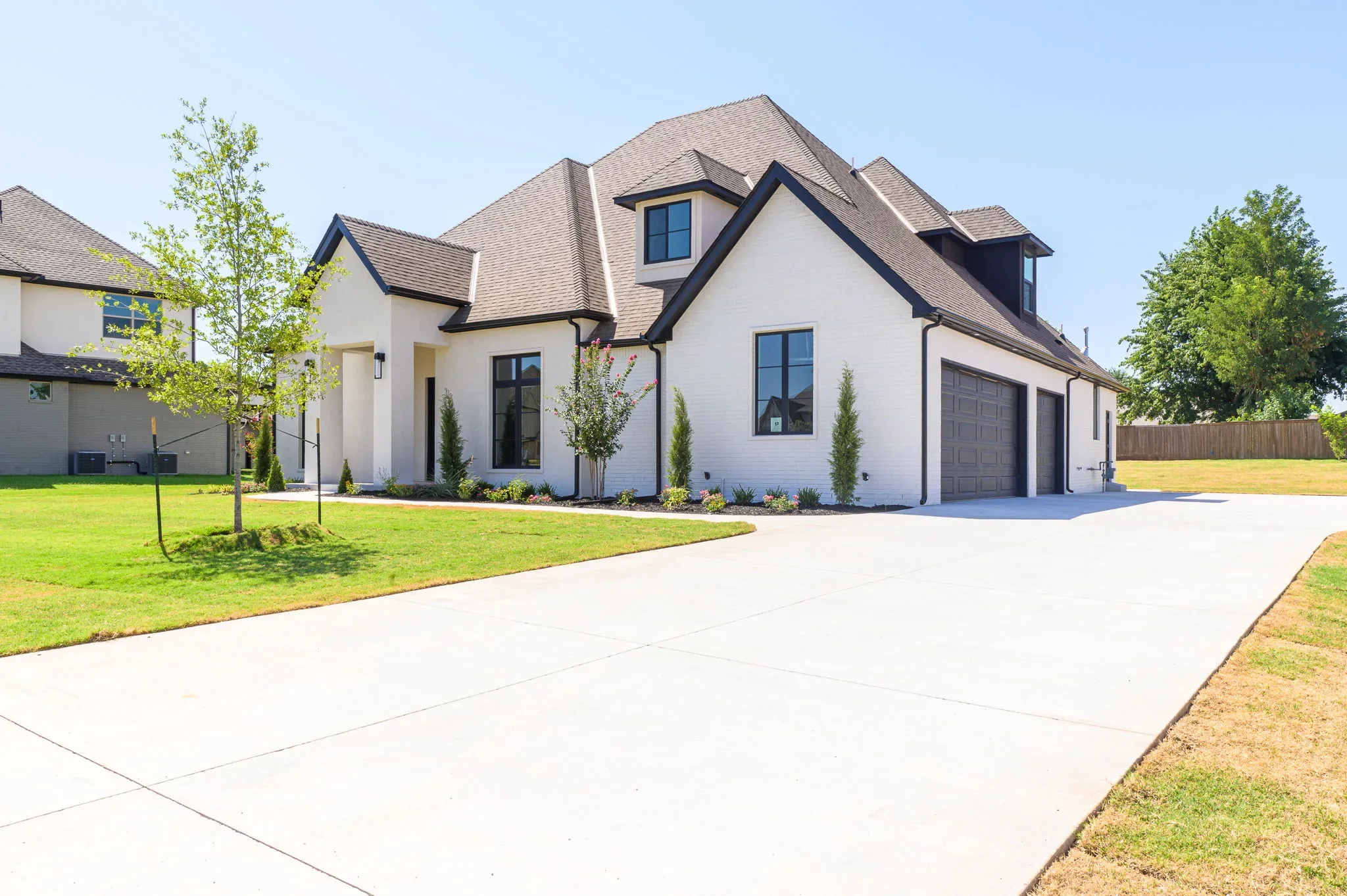 Angled front exterior of 1216 W. Pampas Way with its broad driveway