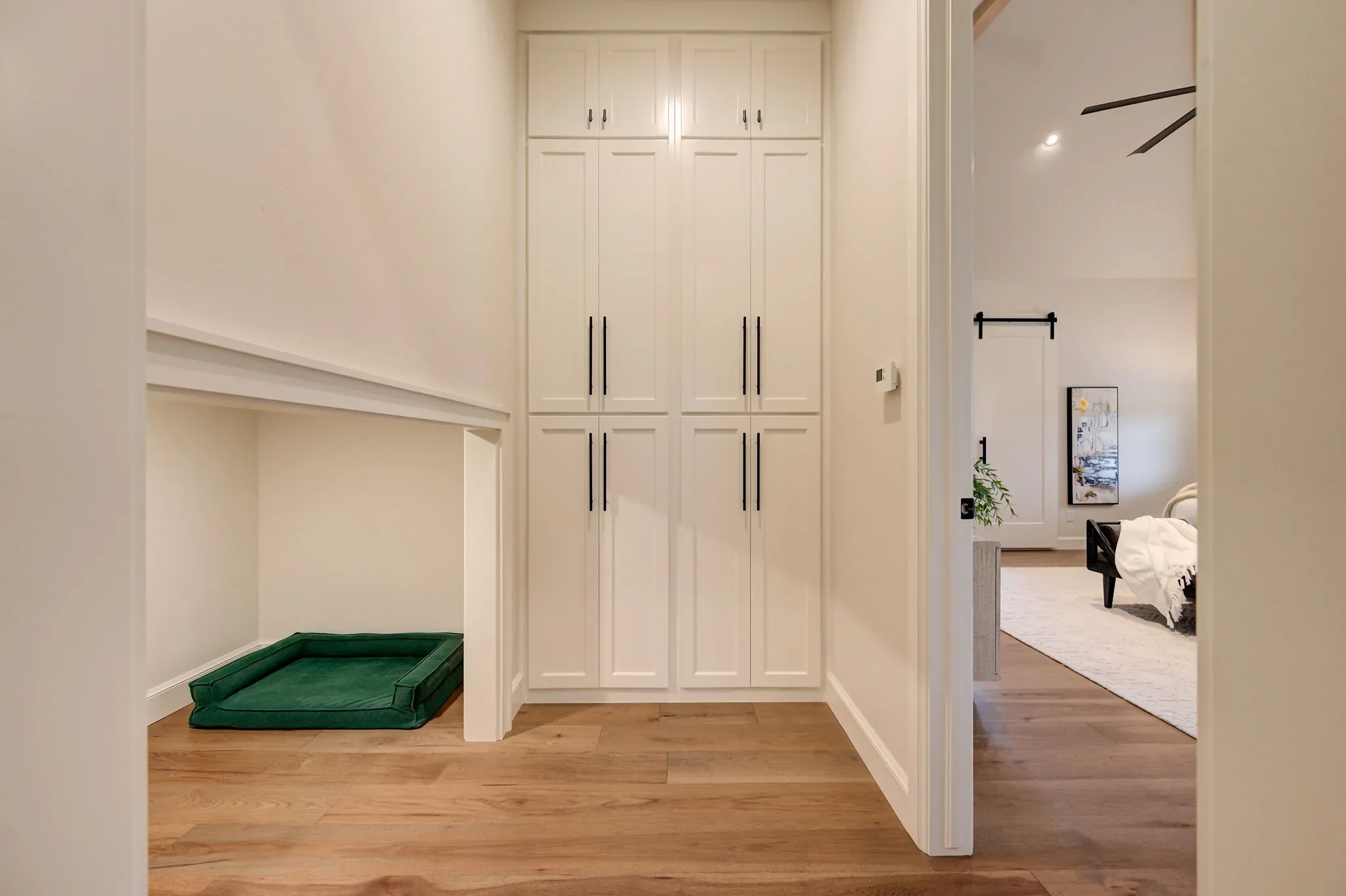 Mudroom storage with built-in pet bed alcove